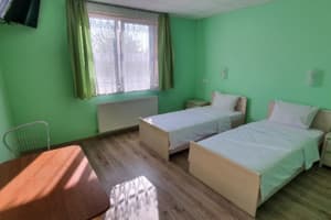 Готель Luxor Inn & Suites. Покращений двомісний з роздільними ліжками 1